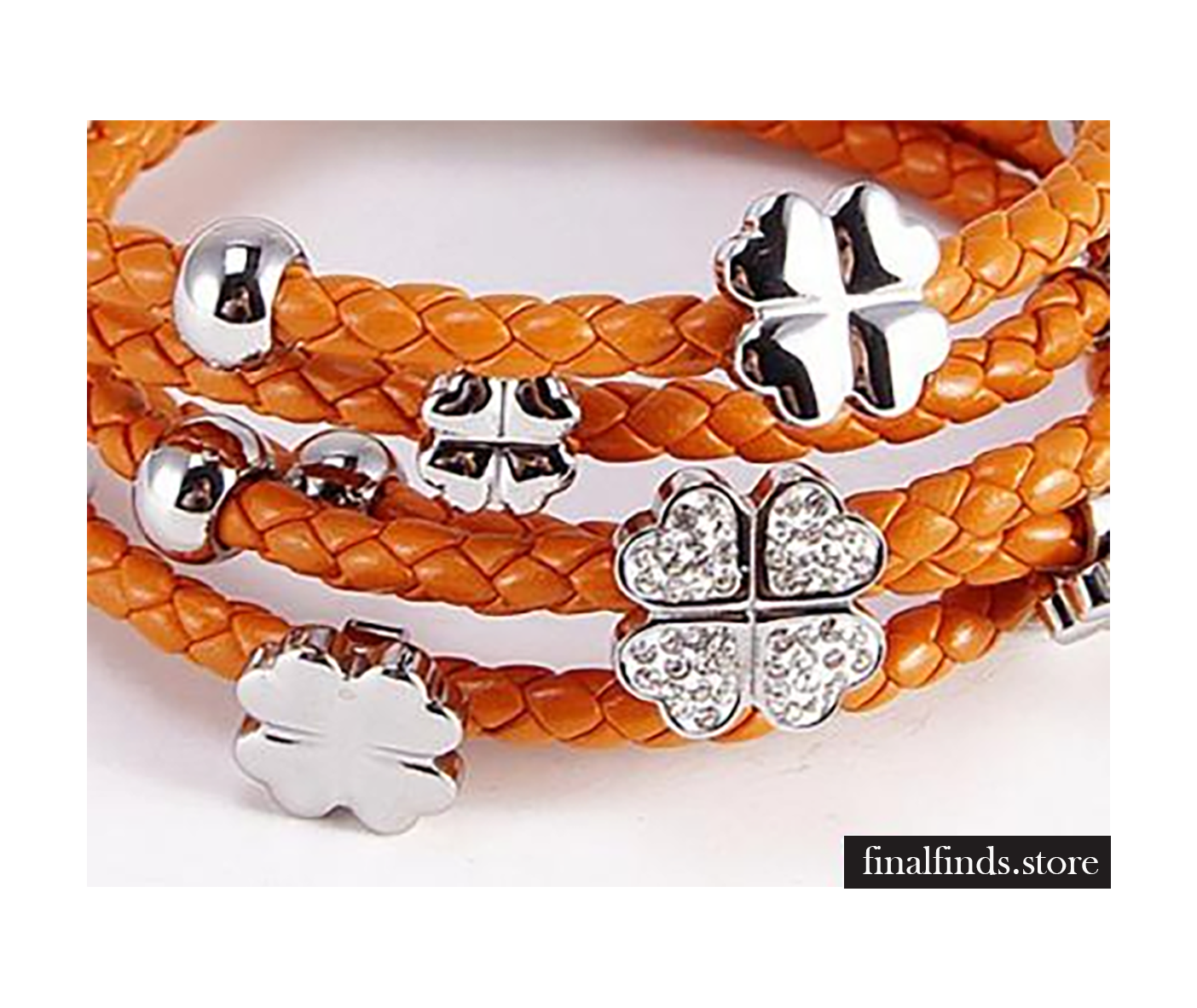 Oranje leren armband met zilveren met bloemetje. NBNNSB340