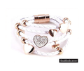 Wit leren armband met gouden hartjes - wit. NBNNSB332